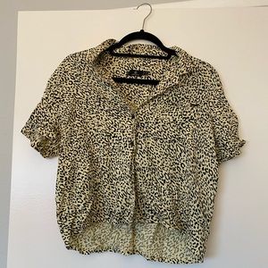 cheetah print button-up top